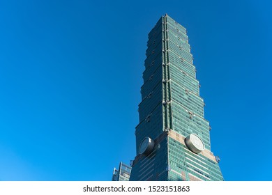 Taipei 101 Skyscraper Building Close Up View Over Dark Blue Sky. Taipei, Taiwan. AUG 06, 2019