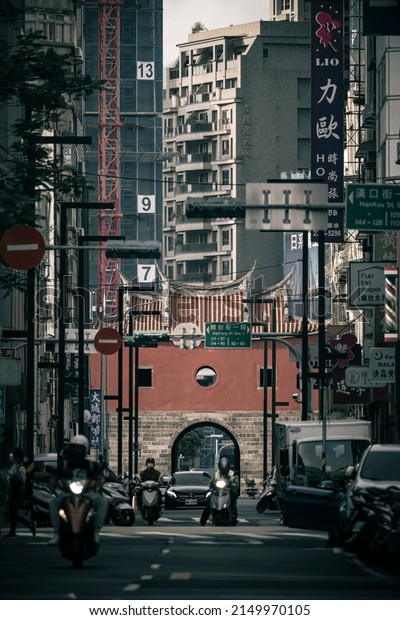 Taipei City Wall-North Gate,\
Taipei\
City,Taiwan,April 23, 2022:Street view in front of the ancient city\
gate with a telephoto\
lens