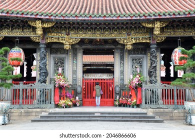 Taipei, Taiwan 9 December 2019: Buddhist Prayer at Sanchuan (Front) Hall of Lungshan (or Langshan) Temple of Manka (a Most Beautiful Chinese folk religious temple in Taipei).