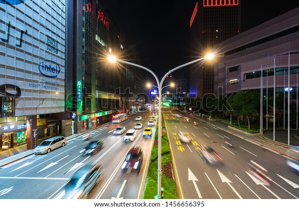 Taipei, Taiwan- 9 June, 2019: traffic on Road at\
night in Taipei,\
Taiwan.