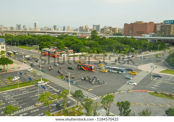 Taipei, Taiwan - Aug 9, 2018 : View of a city\
road intersection in the downtown area near Taipei main station in\
Taipei, Taiwan on August 9,\
2018.