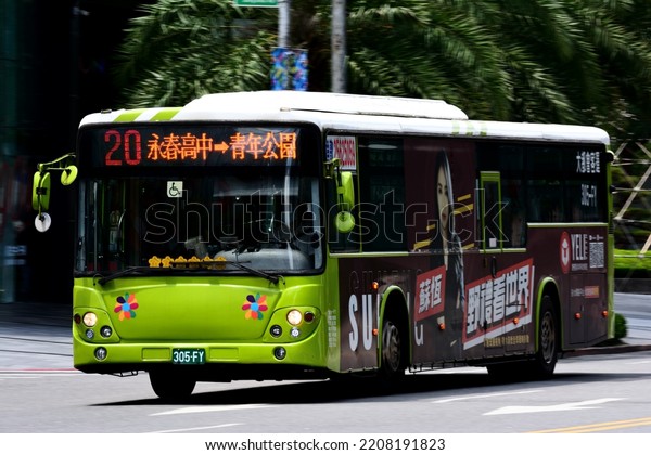 Taipei, Taiwan - 8／29／2022: City bus\
No. 20 on the road in the business district of\
Taipei.