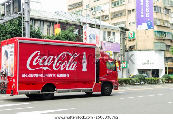 TAIPEI, TAIWAN - DEC 11\
2019. Coca-Cola transport truck. Coca-Cola is a soft drink sold\
around the world by the Coca-Cola Company, headquartered in\
Atlanta, Georgia