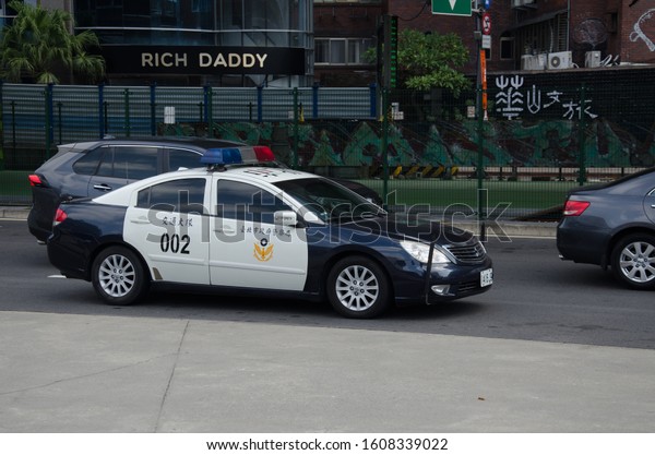 TAIPEI, TAIWAN - DEC 11 2019. Police car on\
street in Taipei - the capital of\
Taiwan