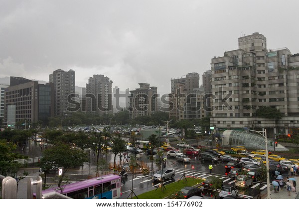 TAIPEI, TAIWAN - JULY 7: City of Taipei, the New\
Capital city of the Taiwan island (formerly called Formosa) that\
replaced fromer capital Tainan, during a storm on July 7th, 2013 in\
Taipei, Taiwan.