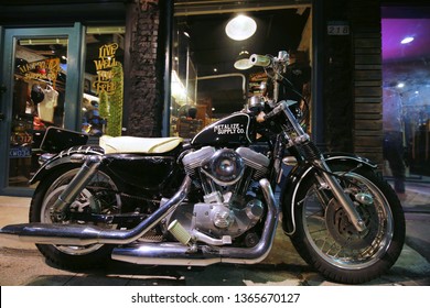 Taipei Taiwan - March 10, 2019: A street shot Looking over Harley Davidson been display in front of Metalize production fashion shop on Civic Blvd in East Taipei 