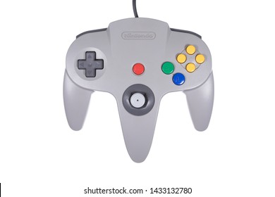 Taipei, Taiwan - May 31, 2019: A Floating Gray Nintendo 64 Controller Isolated On A White Background