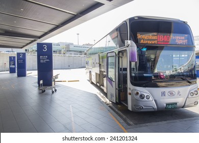 Taipei, Taiwan - November 23, 2014: An airport city bus is parked at the airport bus terminal at Taoyuan airport in Taoyuan County.
