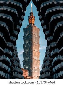 Taipei/Taiwan - August 2019: Symmetrical Shot Of Taipei 101 Through Tao Zhu Yin Yuan Tower