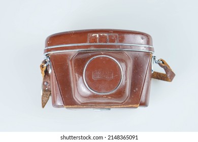 Taipei,Taiwan-Mar 10 2022:Zeiss Ikon Contaflex SLR film camera leather case isolated on white background 