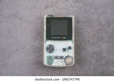 Taipei,Taiwan-May 01 2021:Nintendo Gameboy Color Console Clear Isolated On Grey Background 