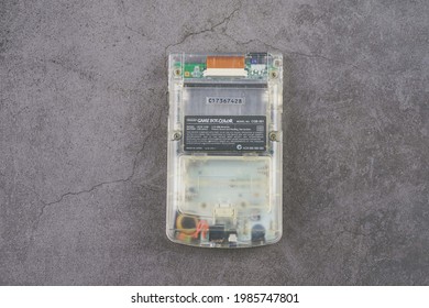 Taipei,Taiwan-May 01 2021:Nintendo Gameboy Color Console Clear Isolated On Grey Background 