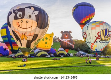 Taitung, Taiwan - June 30, 2019: Various Shape Balloons With Beautiful Sunrise And Green Grass At Luye Highland, Taiwan International Balloon Festival