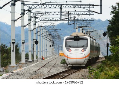 Taitung, Taiwan-3／23／2021: A Taroko Express Train Passes By At The Intersection Of The Old And New Routes.