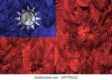 Taiwan flag depicted on many leafs of monstera palm trees. Trendy fashionable backdrop