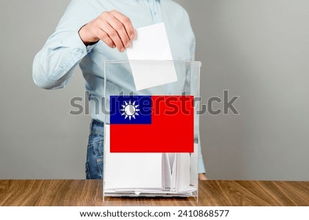 Taiwan flag, Republic of China ROC Ballot box with ballots. Elections, voting, referendum, suffrage, democracy concept.