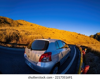 Taiwan, JAN 19 2014 - Sunny View Of A Toyota Prius Car On The Mountain