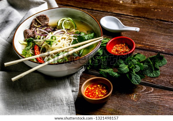 Taiwan Niu Rou Mian(Beef noodle soup, often\
referred to as beef noodles, is a Chinese and Taiwanese noodle soup\
made of stewed or red braised beef, beef broth, vegetables and\
Chinese noodles)