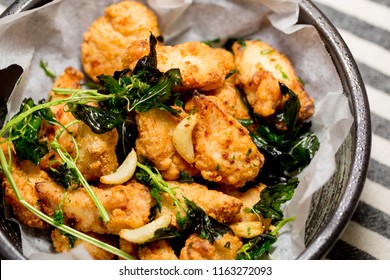 Taiwanese Fried Basil And Deep Fried Popcorn Chicken.