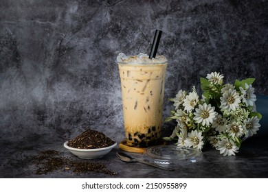 Taiwanese Milk Tea In A Plastic Cup With Ice