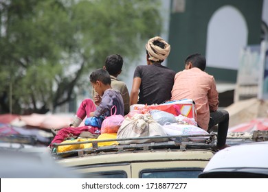 Taiz _ Yemen _ 17 Apr 2020: Because of the ongoing war and the blockade imposed on Yemen, these children are forced to ride roofs of cars as they travel from Taiz countryside to the city.