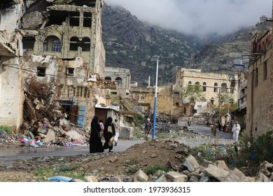 Taiz _ Yemen _ 29 Apr 2021 : Yemenis Walking On The Rubble Of Houses Destroyed By The War In Yemen, Taiz