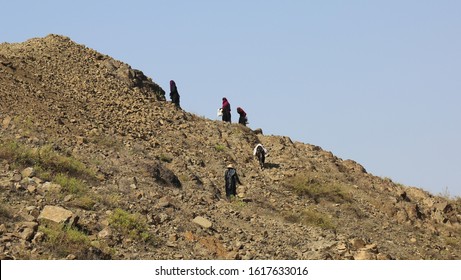 Taiz  Yemen - 02 Apr 2017: Women Bring Their Food And Drink Needs Through Rugged Mountain Roads Because Of Al-Houthi Militia Siege Of The Villages Of Jabal Habashi District In The West Of Taiz City