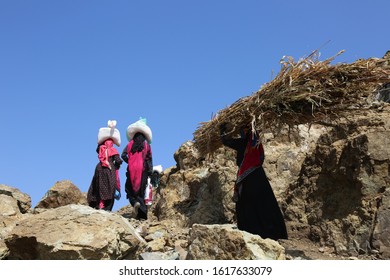 Taiz / Yemen - 02 Apr 2017: Women Bring Their Food And Drink Needs Through Rugged Mountain Roads Because Of Al-Houthi Militia Siege Of The Villages Of Jabal Habashi District In The West Of Taiz City