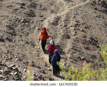 Taiz / Yemen - 02 Apr 2017: Women Bring Their Food And Drink Needs Through Rugged Mountain Roads Because Of Al-Houthi Militia Siege Of The Villages Of Jabal Habashi District In The West Of Taiz City