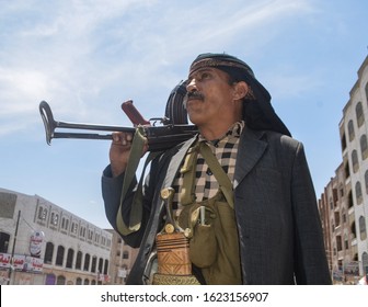 Taiz  Yemen - 10 Feb 2015 : A Yemeni Fighter Wearing A Popular Dress Carries A Weapon And Fights The Houthi Militia In The City Of Taiz