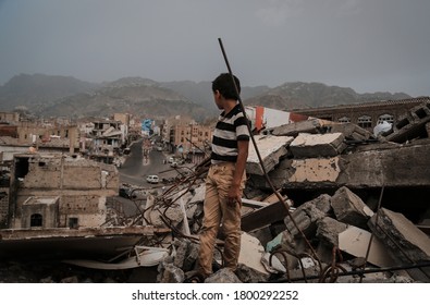 Taiz  Yemen - 22 Aug 2016 : A Yemeni Child Witnesses The Destruction Of Homes In The City Of Taiz Due To The War