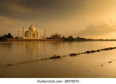 Taj Mahal, Agra, India. Romantic picture taken in sunset scene on  other side of river.