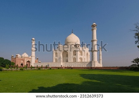 The Taj Mahal is an architectural masterpiece and one of the most iconic landmarks in the world. It is located in Agra, India and was built by the Mughal emperor Shah Jahan in the 17th century. The mo