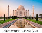 Taj Mahal is a white marble mausoleum on the bank of the Yamuna river in Agra city, Uttar Pradesh state, India