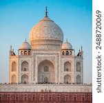 Taj Mahal is a white marble mausoleum on the bank of the Yamuna river in Agra city, Uttar Pradesh state, India