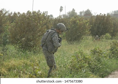 TAJI, IRAQ, AUGUST 13th 2008 - 25th Infantry Division Soldiers Conducting A Patrol And Setting Up A Checkpoint.