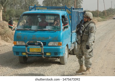 TAJI, IRAQ, AUGUST 13th 2008 - 25th Infantry Division Soldiers Conducting A Patrol And Setting Up A Checkpoint.