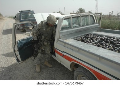 TAJI, IRAQ, AUGUST 13th 2008 - 25th Infantry Division Soldiers Conducting A Patrol And Setting Up A Checkpoint.