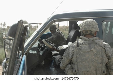 TAJI, IRAQ, AUGUST 13th 2008 - 25th Infantry Division Soldiers Conducting A Patrol And Setting Up A Checkpoint.