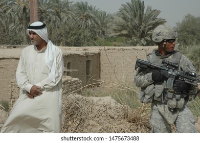 TAJI, IRAQ, AUGUST 13th 2008 - 25th Infantry Division Soldiers Conducting A Patrol And Setting Up A Checkpoint.