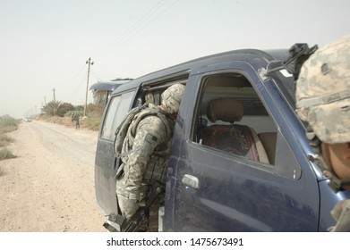 TAJI, IRAQ, AUGUST 13th 2008 - 25th Infantry Division Soldiers Conducting A Patrol And Setting Up A Checkpoint.