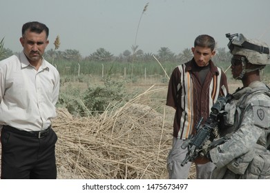 TAJI, IRAQ, AUGUST 13th 2008 - 25th Infantry Division Soldiers Conducting A Patrol And Setting Up A Checkpoint.