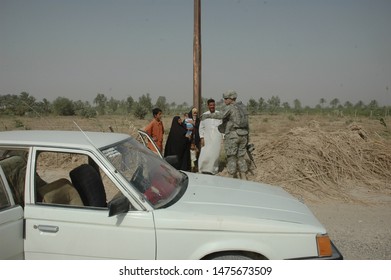 TAJI, IRAQ, AUGUST 13th 2008 - 25th Infantry Division Soldiers Conducting A Patrol And Setting Up A Checkpoint.