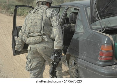 TAJI, IRAQ, AUGUST 13th 2008 - 25th Infantry Division Soldiers Conducting A Patrol And Setting Up A Checkpoint.