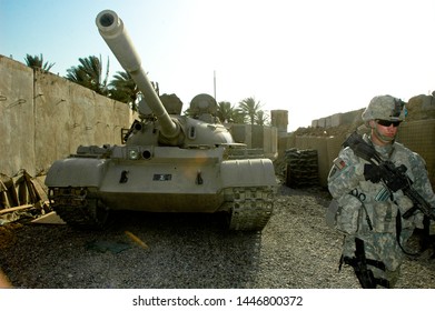 TAJI, IRAQ, August 8th, 2008 - US Army Soldiers From The 25th Infantry Division Conducting A Patrol.