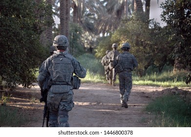 TAJI, IRAQ, August 8th, 2008 - US Army Soldiers From The 25th Infantry Division Conducting A Patrol.