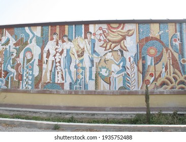 Tajikistan - 27 November 2019:  Soviet Mosaic Closeup Detail. Detail Of Old Antique Mosaic. Typical Plot Of Street Art Of USSR Period. Mass Street Culture Of Primitive Soviet Poster. Mosaic