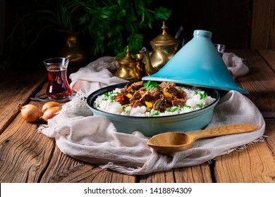 الطبخ المغربي الطحين المغربي Tajin-beef-stew-rice-paprika-260nw-1418894309