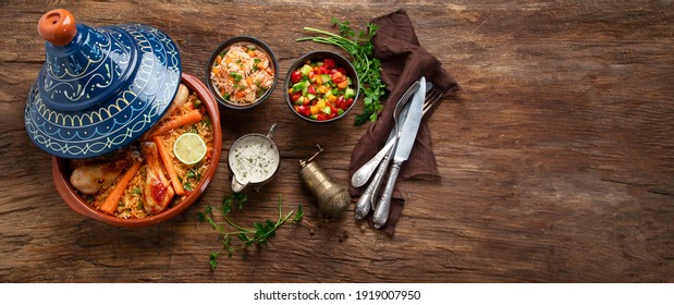 الطبخ المغربي الطحين المغربي Tajin-chicken-stew-rice-vegetables-260nw-1919007950