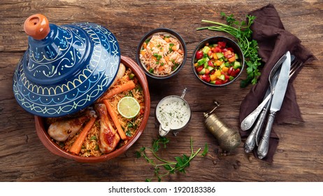 الطبخ المغربي الطحين المغربي Tajin-chicken-stew-rice-vegetables-260nw-1920183386